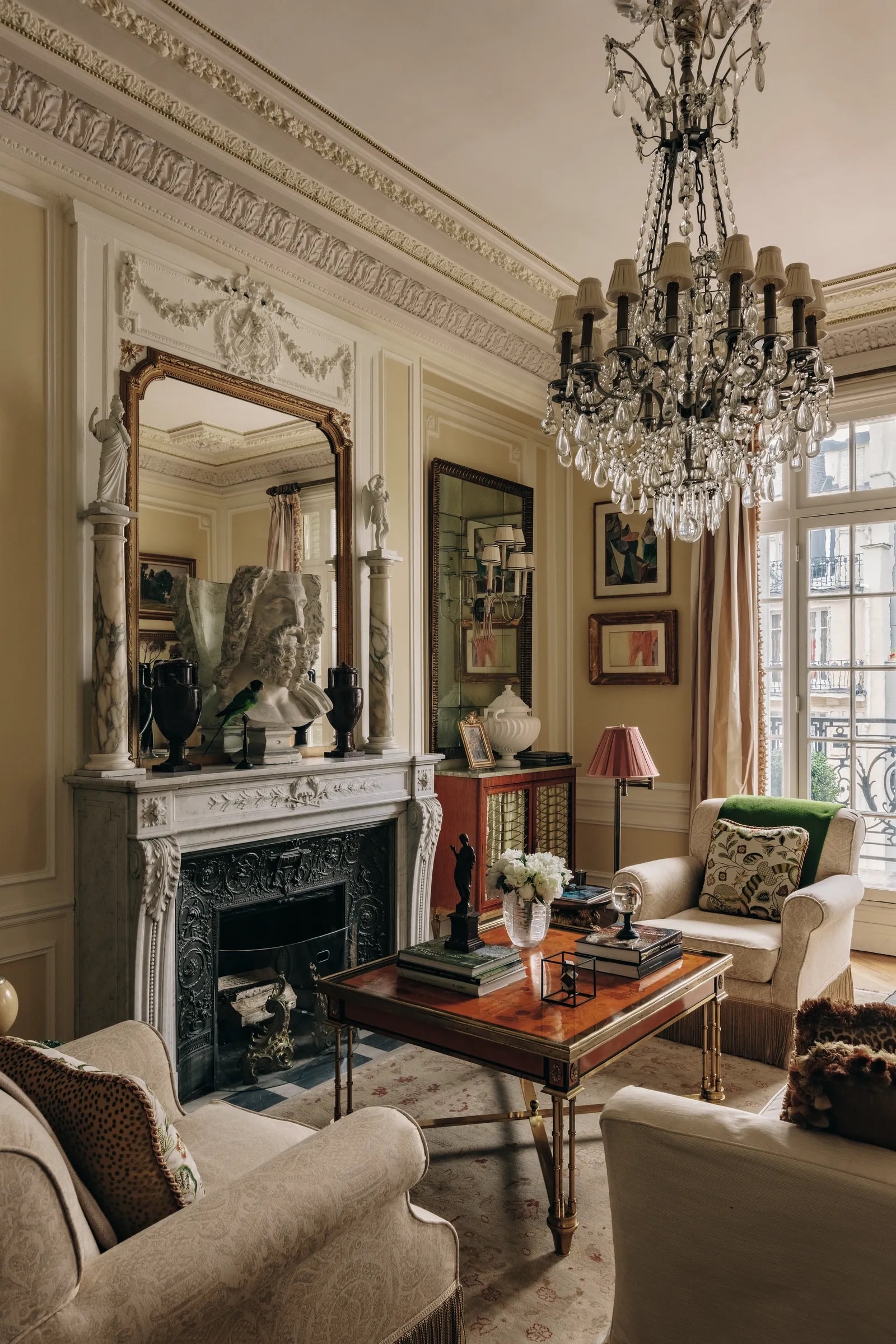 Elegant French apartment interior with antique art